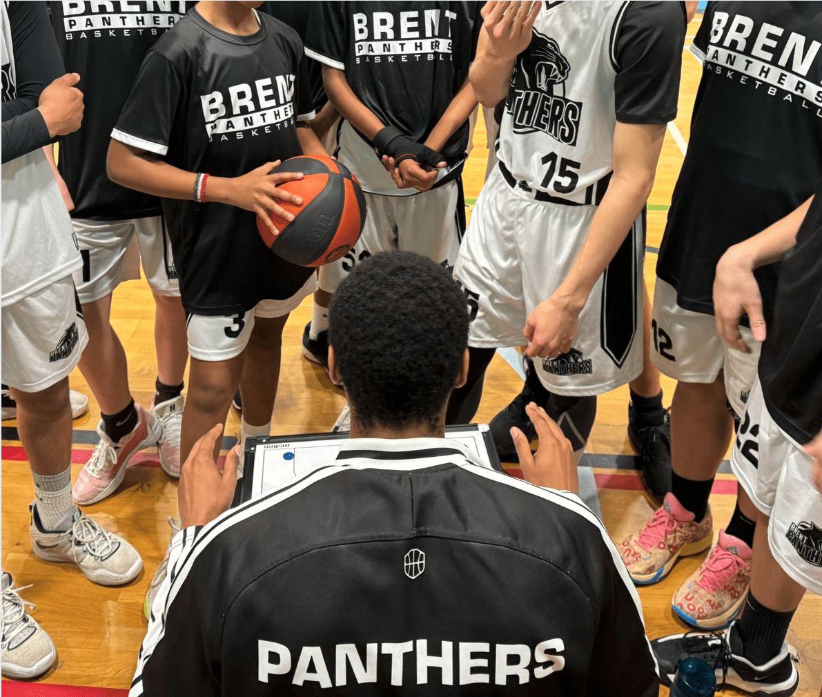 Panthers Coaches Huddle